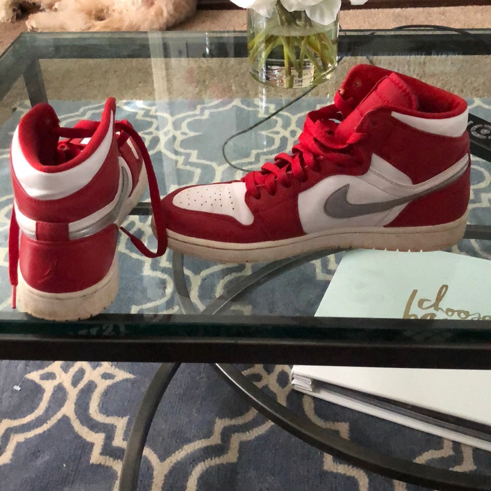 Red and white nike high tops